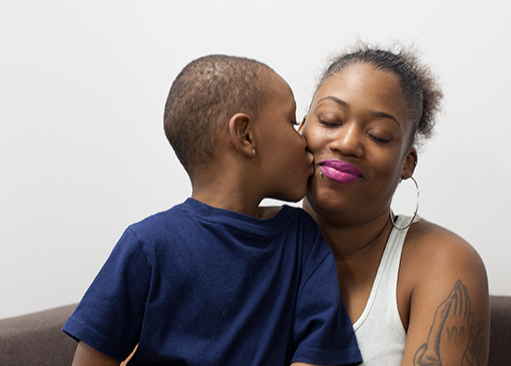 mom and child hugging each other