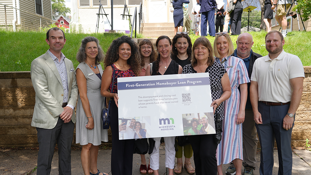 Minnesota_Housing_Staff_with_FirstGen_sign
