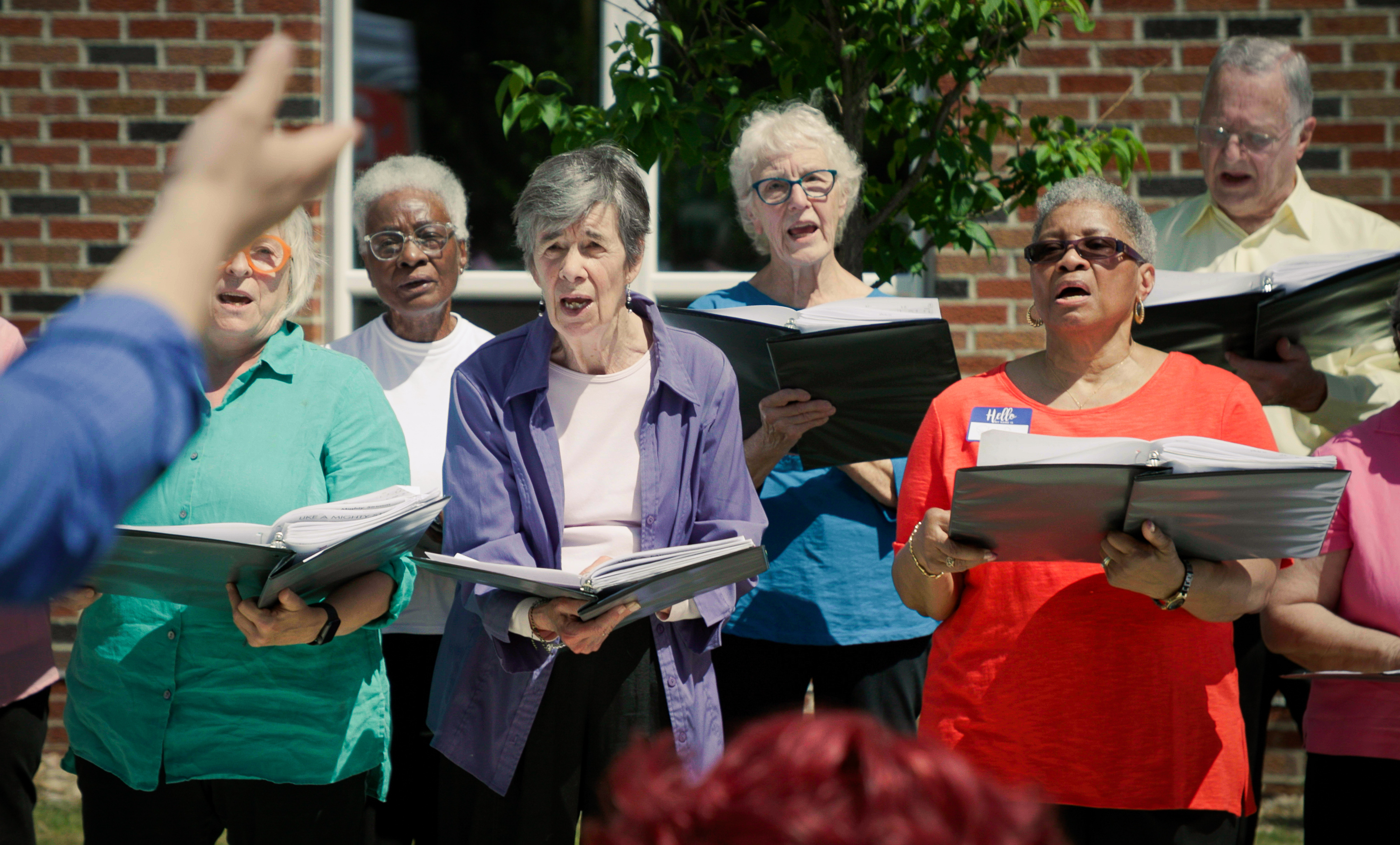 Women singing outside